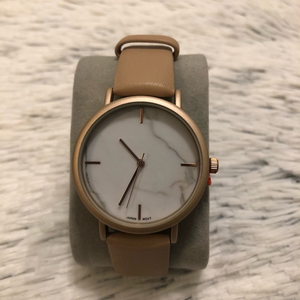 White marble face rose gold and tan watch